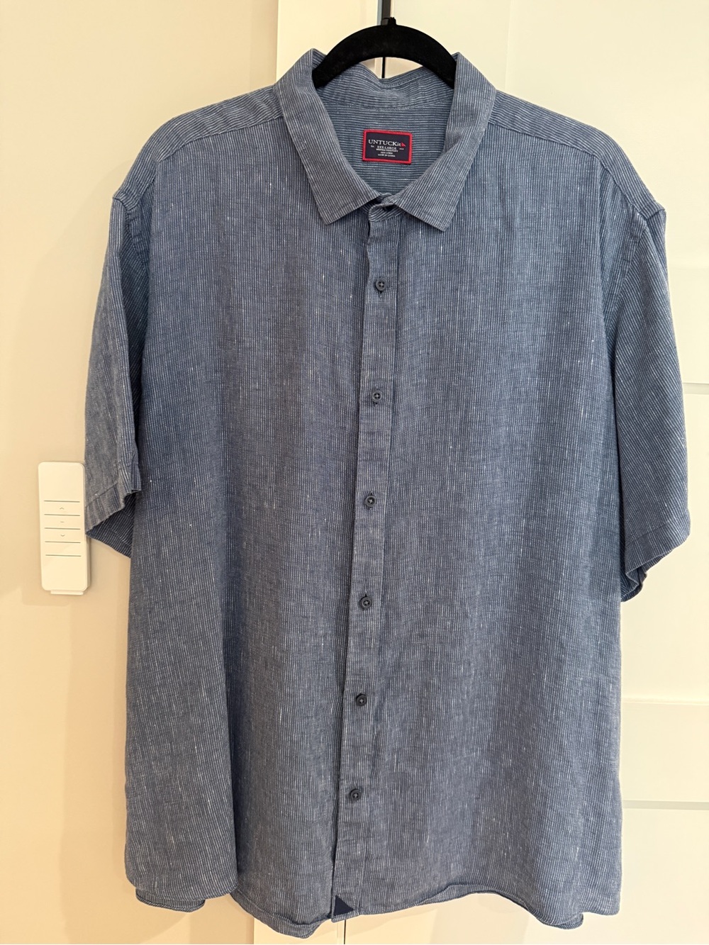 UNTUCKit Canon short sleeve button-front shirt in blue with fine white stripes